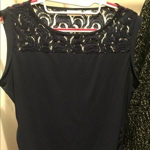 Sleeveless navy blouse